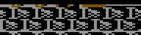 The top edge of the screen at area 1's gate in the 1985 release: brown marks above the wall