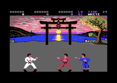 A round about to start: three karateka on the floor below a torii gate at sunset, the judge between them