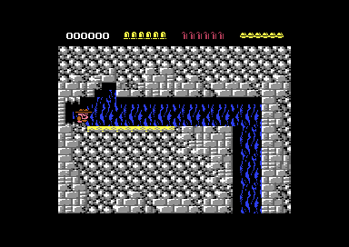 The first room: Rick at the left of a grey stone cave crossed by blue water, below the score panel