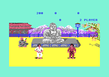 The seated judge raising a flag at the end of a two-player game, in front of the Buddha